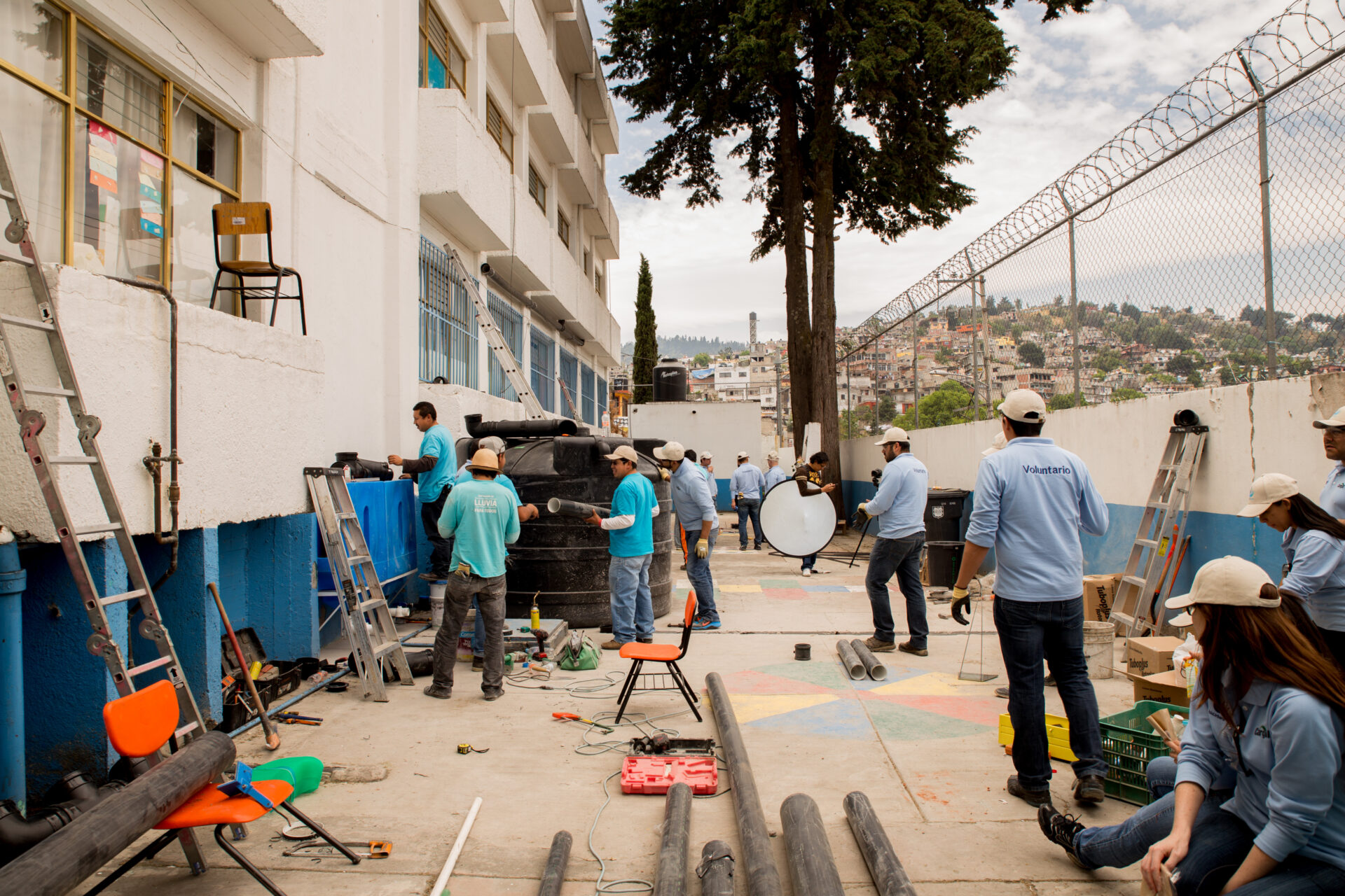 Installation at a public school Mexico City with volunteers_Credit Marcelo Castillo